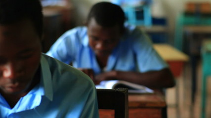 Wall Mural - Students test taking in class in Kenya.