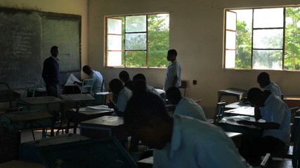 Wall Mural - Students testing in a class in Africa.