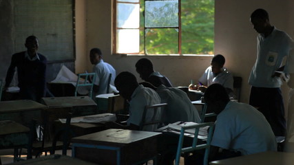 Wall Mural - Kenya Students testing in a class in Africa.