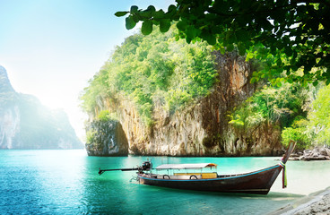 Wall Mural - long boat on island in thailand
