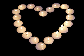 Heart shape made from candles