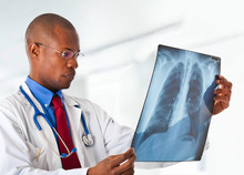 Black Doctor Watching X-ray