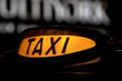 taxi sign by night