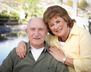 Happy Senior Couple Relaxing in The Park