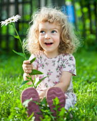 Wall Mural - Child with flower