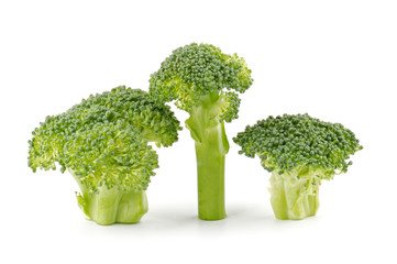 Wall Mural - Three broccoli florets isolated on white background