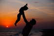 © Max Topchii - Father and little son silhouettes