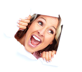 Wall Mural - Happy young woman looking through a hole.