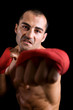 © cristovao31 - Young Boxer fighter over black background