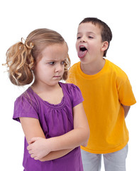 Upset little girl bullied by older boy