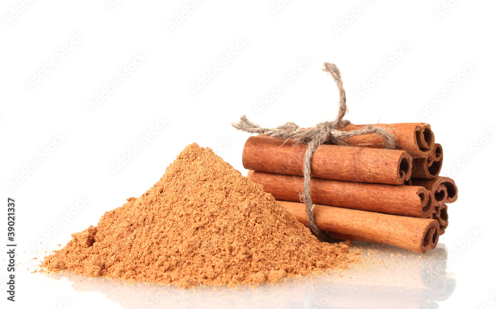 Cinnamon sticks and powder isolated on white