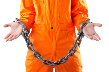 Criminal in orange robe in prison