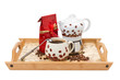 coffee pot with cup, red bag on wooden tray