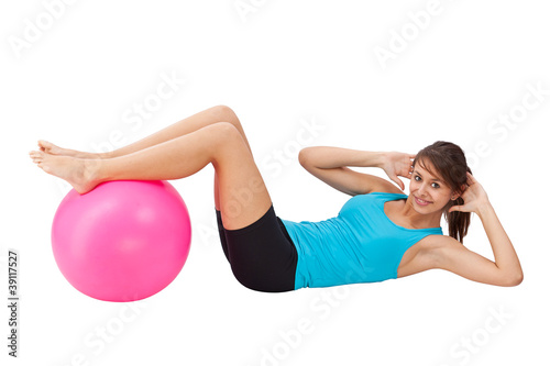 Plakat Dziewczyna ćwiczy z sprawności fizycznej piłką