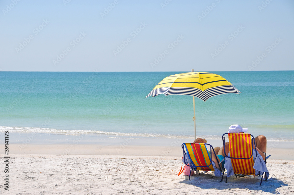 Enjoying a Day at the Beach Stock Photo | Adobe Stock