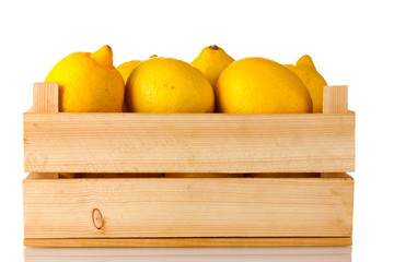 Wall Mural - ripe lemon in wooden box isolated on white