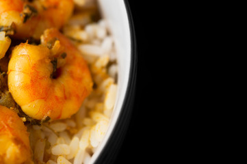 Curry Prawns with Rice - Macro and Black background