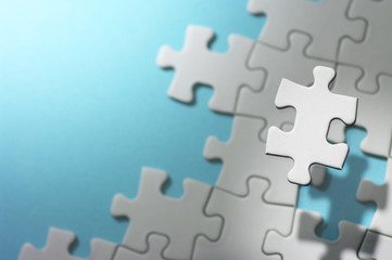Aufkleber - Floating jigsaw puzzle piece in spot light.