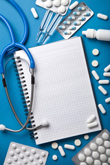 Wall Mural - medical background with notebook