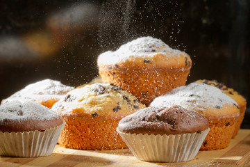 Falling caster sugar on vanilla muffin