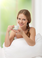 Poster - beautiful girl drinking coffee in bed