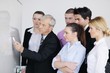 © .shock - Senior business man giving a presentation