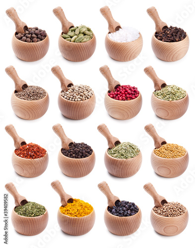 collection of wooden bowls full of different spices Canvas Print