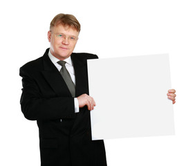 Businessman holding a banner ad isolated on white background