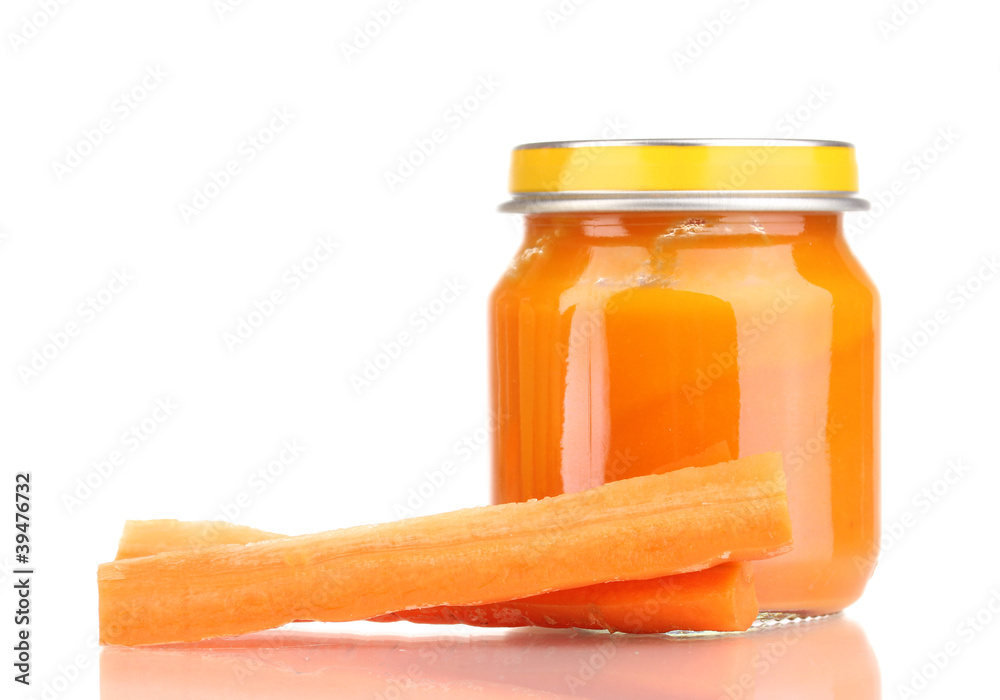 Jar of baby puree with carrot isolated on white