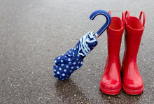 Red Rain Boots And Umbrella