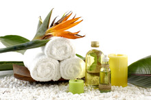 Wooden Bowl Of Towel And Spring Flower With Massage Oil