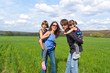© Iuliia Sokolovska - Happy family outdoors having fun on vacation