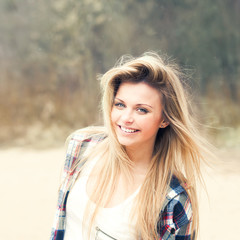 beautiful girl smiling on a sunny day