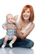 © Nejron Photo - Beautiful redhead woman with her child.