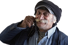 Old Lebanese Man With Hands On His Mustache Swearing