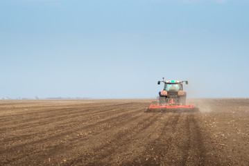 Wall Mural - Tractor plowing