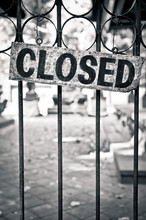 Closed Sign On A Metal Bars