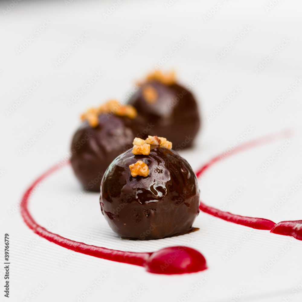 Marzipan Trüffel mit Krokant an Himbeermark Stock Photo | Adobe Stock