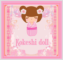 Kokeshi Doll On The Pink Background