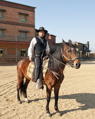 Fototapete - Cowboy Sheriff on his horse