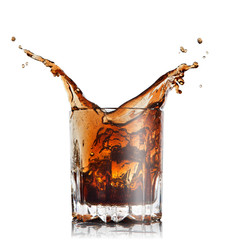 Wall Mural - splash of cola in glass with ice cubes isolated on white