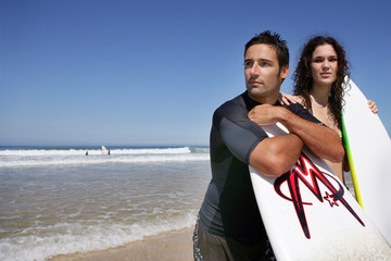 Surfing couple