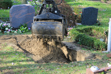 Gravedigger At Work