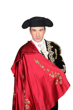 Man In A Matador Costume With A Red Cape