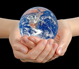 Wall Mural - Planet earth on palms.Elements of this image furnished by NASA
