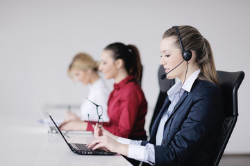 Wall Mural - business woman group with headphones