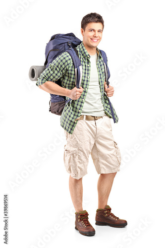 Fotografie, Obraz Full length portrait of a hiker with backpack posing