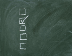 Checklist at the blackboard with copy space