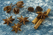 Anise And Cinnamon Over Blue Background