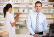 © Monkey Business - UK nurse and pharmacist working in pharmacy